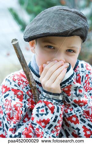 Boy warming hands, portrait View Large Photo Image Stock Photo - Boy warming hands, portrait. Fotosearch