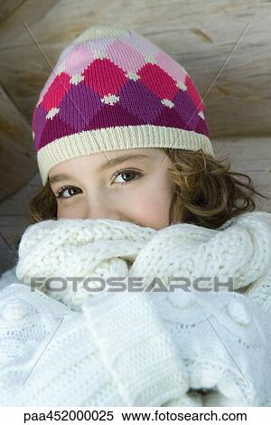Girl wearing warm clothes, portrait View Large Photo Image Stock Photography - Girl wearing warm clothes, portrait. Fotosearch