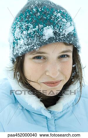 Teenage girl wearing winter clothes in snow, close-up, portrait View Large Photo Image Stock Image - Teenage girl wearing winter clothes in snow, close-up, portrait. Fotosearch