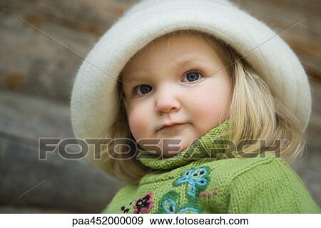 Stock Photo - Toddler girl, portrait. Fotosearch