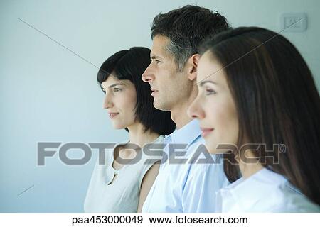 Three business associates in profile, portrait, head and shoulders View Large Photo Image Stock Photo - Three business associates in profile, portrait, head and shoulders. Fotosearch