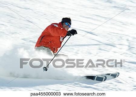 Mature skier on ski slope, smiling, blurred motion View Large Photo Image Stock Image - Mature skier on ski slope, smiling, blurred motion. Fotosearch