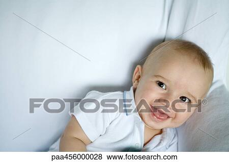 Baby smiling at camera, portrait View Large Photo Image Stock Photo - Baby smiling at camera, portrait. Fotosearch