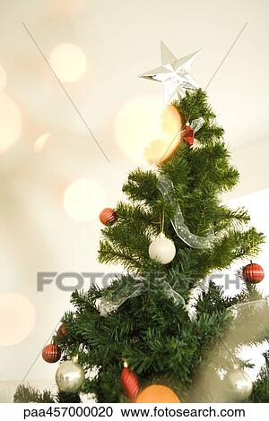 Christmas tree, view through Christmas lights, selective focus View Large Photo Image Stock Image - Christmas tree, view through Christmas lights, selective focus. Fotosearch