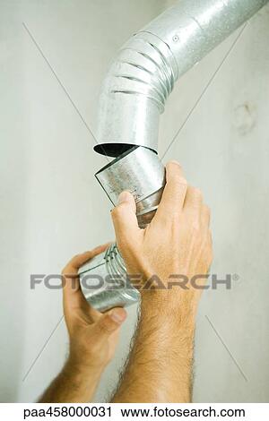 Man repairing air duct, cropped view of hands View Large Photo Image Stock Image - Man repairing air duct, cropped view of hands. Fotosearch