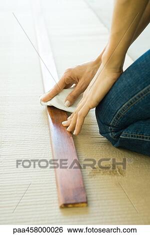 Woman preparing wood plank, cropped view View Large Photo Image Stock Photograph - Woman preparing wood plank, cropped view. Fotosearch