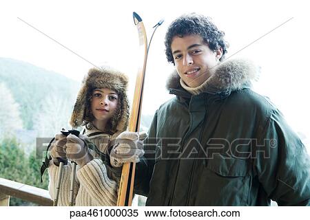 Teen brother and sister with ski gear, smiling at camera, portrait View Large Photo Image Stock Photography - Teen brother and sister with ski gear, smiling at camera, portrait. Fotosearch