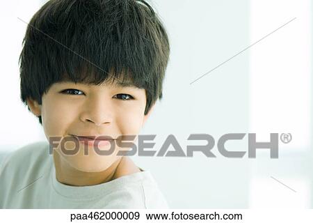Boy smiling at camera, portrait View Large Photo Image Stock Photo - Boy smiling at camera, portrait. Fotosearch