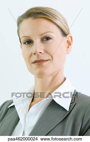 Businesswoman smiling at camera, portrait View Large Photo Image Picture - Businesswoman smiling at camera, portrait. Fotosearch