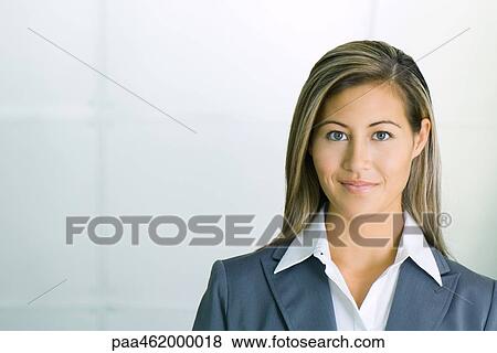 Businesswoman smiling at camera, portrait View Large Photo Image Stock Photo - Businesswoman smiling at camera, portrait. Fotosearch