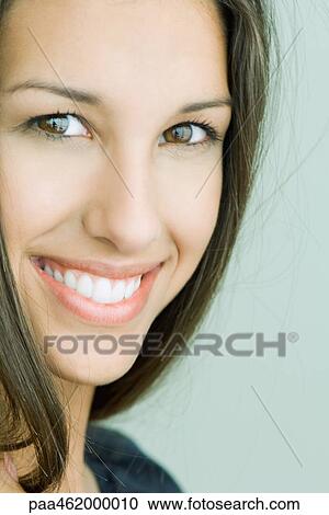 Female smiling at camera, portrait View Large Photo Image Stock Image - Female smiling at camera, portrait. Fotosearch