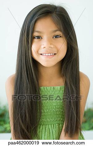 Girl smiling at camera, portrait View Large Photo Image Stock Photo - Girl smiling at camera, portrait. Fotosearch