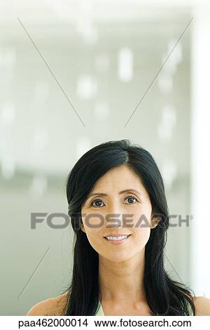 Picture - Woman smiling at camera, portrait. Fotosearch