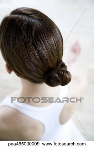 Brunette woman wearing hair in chignon, rear view View Large Photo Image Stock Photo - Brunette woman wearing hair in chignon, rear view. Fotosearch