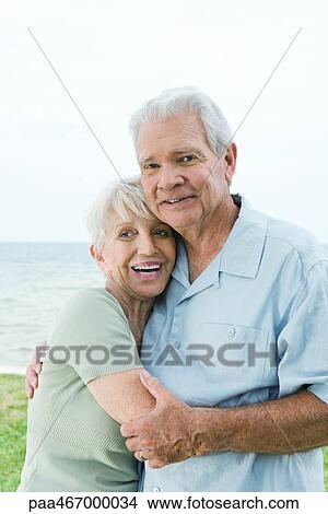 Picture - Senior couple hugging. Fotosearch