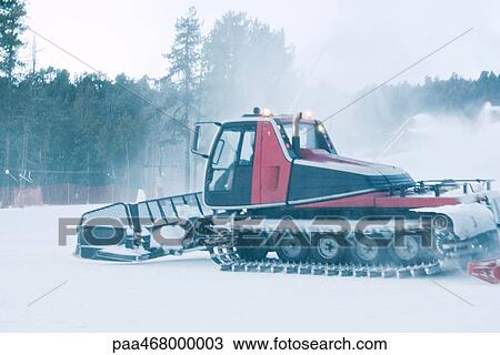 Stock Image - Snow plough on snow. Fotosearch