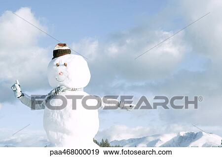 Snowman, person's arms emerging from behind, pointing in different directions View Large Photo Image Stock Photo - Snowman, person's arms emerging from behind, pointing in different directions. Fotosearch