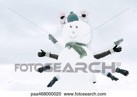 Snowman, several people's arms emerging from behind View Large Photo Image Stock Image - Snowman, several people's arms emerging from behind. Fotosearch