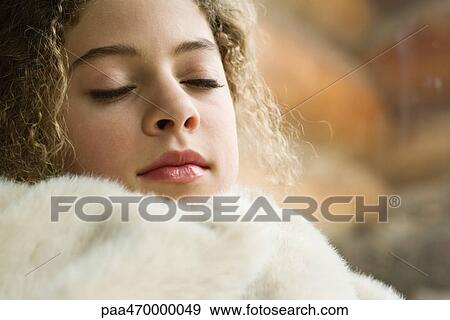 Teen girl sleeping under soft blanket, close-up View Large Photo Image Stock Photo - Teen girl sleeping under soft blanket, close-up. Fotosearch