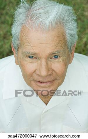 Senior man smiling up at camera, portrait View Large Photo Image Stock Photo - Senior man smiling up at camera, portrait. Fotosearch