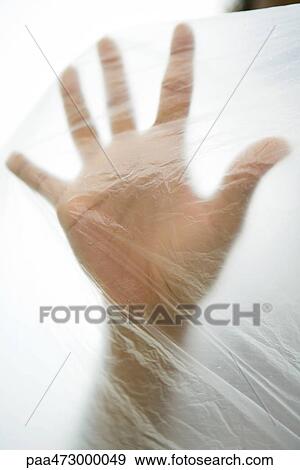 Hand inside plastic bag, cropped view View Large Photo Image Stock Photo - Hand inside plastic bag, cropped view. Fotosearch