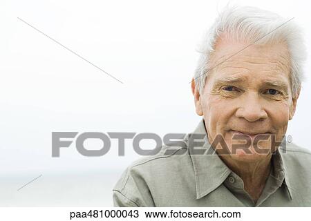 Senior man smiling at camera, portrait View Large Photo Image Stock Image - Senior man smiling at camera, portrait. Fotosearch
