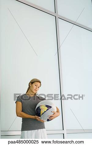 Woman holding bandaged globe View Large Photo Image Stock Photography - Woman holding bandaged globe. Fotosearch