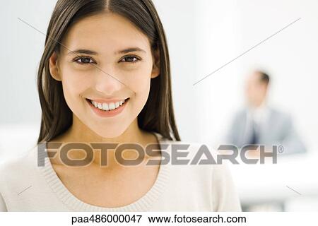 Businesswoman smiling at camera, portrait View Large Photo Image Stock Photo - Businesswoman smiling at camera, portrait. Fotosearch