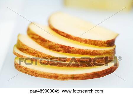 Apple slices, close-up View Large Photo Image Stock Photography - Apple slices, close-up. Fotosearch