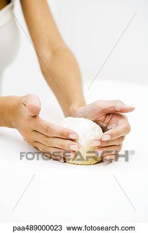 Woman kneading dough, cropped view of hands View Large Photo Image Stock Image - Woman kneading dough, cropped view of hands. Fotosearch