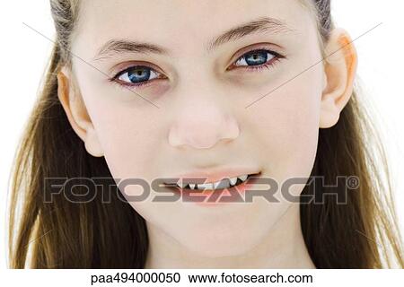 Preteen girl smiling at camera, headshot, portrait View Large Photo Image Stock Image - Preteen girl smiling at camera, headshot, portrait. Fotosearch