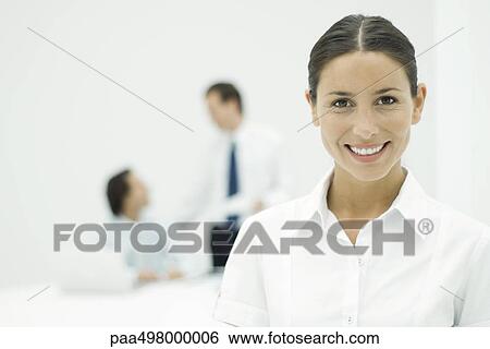 Female professional smiling at camera, portrait View Large Photo Image Stock Photograph - Female professional smiling at camera, portrait. Fotosearch