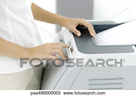 Female using photocopier, cropped view View Large Photo Image Stock Photography - Female using photocopier, cropped view. Fotosearch