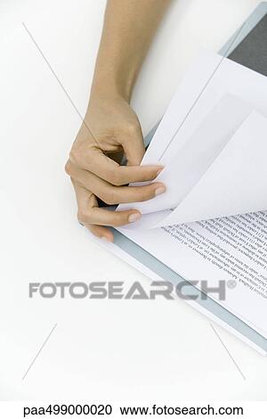 Hand turning document pages, close-up View Large Photo Image Stock Image - Hand turning document pages, close-up. Fotosearch