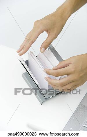 Hands flipping through card file, cropped view View Large Photo Image Stock Image - Hands flipping through card file, cropped view. Fotosearch