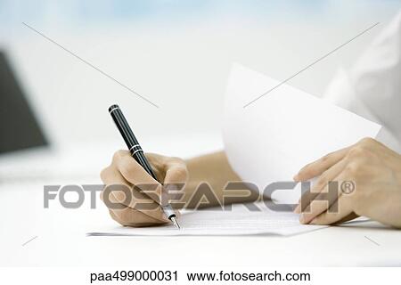 Person signing document with pen, cropped view of hands View Large Photo Image Stock Image - Person signing document with pen, cropped view of hands. Fotosearch