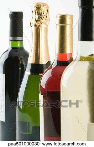 Assorted wine bottles, close-up View Large Photo Image Stock Image - Assorted wine bottles, close-up. Fotosearch
