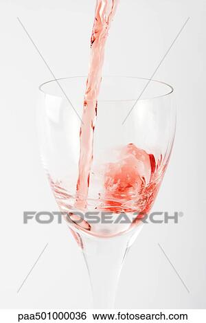 Sherry wine being poured into glass, close-up View Large Photo Image Stock Photograph - Sherry wine being poured into glass, close-up. Fotosearch