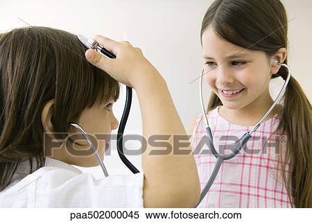 Children playing with stethoscopes View Large Photo Image Stock Photography - Children playing with stethoscopes. Fotosearch