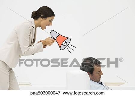 Man sleeping in chair, woman standing behind him, shouting into megaphone View Large Photo Image Stock Photo - Man sleeping in chair, woman standing behind him, shouting into megaphone. Fotosearch