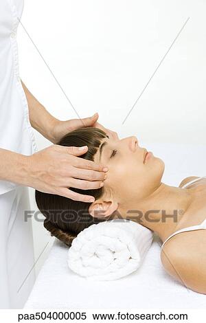 Woman receiving head massage, cropped view View Large Photo Image Stock Photography - Woman receiving head massage, cropped view. Fotosearch