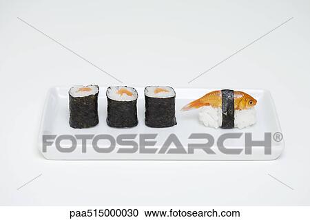 Maki sushi and goldfish nigiri on plate View Large Photo Image Stock Image - Maki sushi and goldfish nigiri on plate. Fotosearch