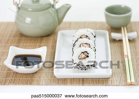 Stock Photo - Place setting for Japanese meal of maki sushi. Fotosearch