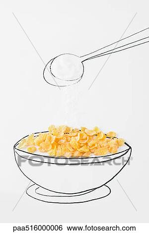 Stock Photograph - Spoon sprinkling sugar on bowl of cereal. Fotosearch