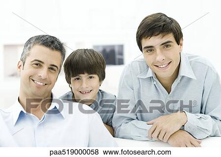 Father and sons smiling at camera, portrait View Large Photo Image Stock Photo - Father and sons smiling at camera, portrait. Fotosearch