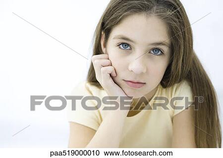 Girl with hand under chin, portrait View Large Photo Image Stock Image - Girl with hand under chin, portrait. Fotosearch