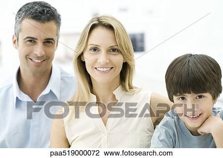 Parents and son smiling at camera, portrait View Large Photo Image Stock Image - Parents and son smiling at camera, portrait. Fotosearch