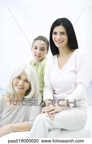Stock Image - Three generations of women, portrait. Fotosearch