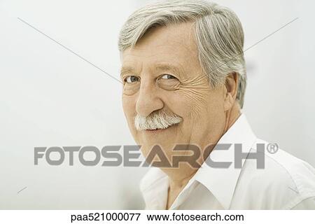 Senior man smiling at camera, portrait View Large Photo Image Stock Photo - Senior man smiling at camera, portrait. Fotosearch