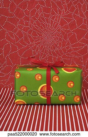 Brightly colored Christmas present View Large Photo Image Stock Image - Brightly colored Christmas present. Fotosearch